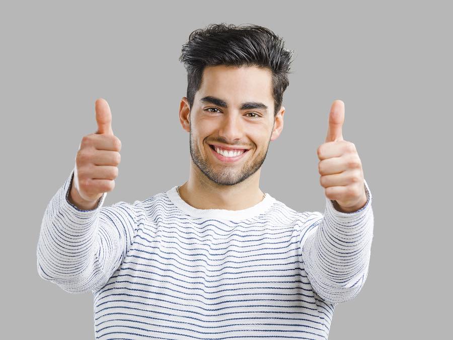 handsome male giving thumbs up for King Dental Cooupons